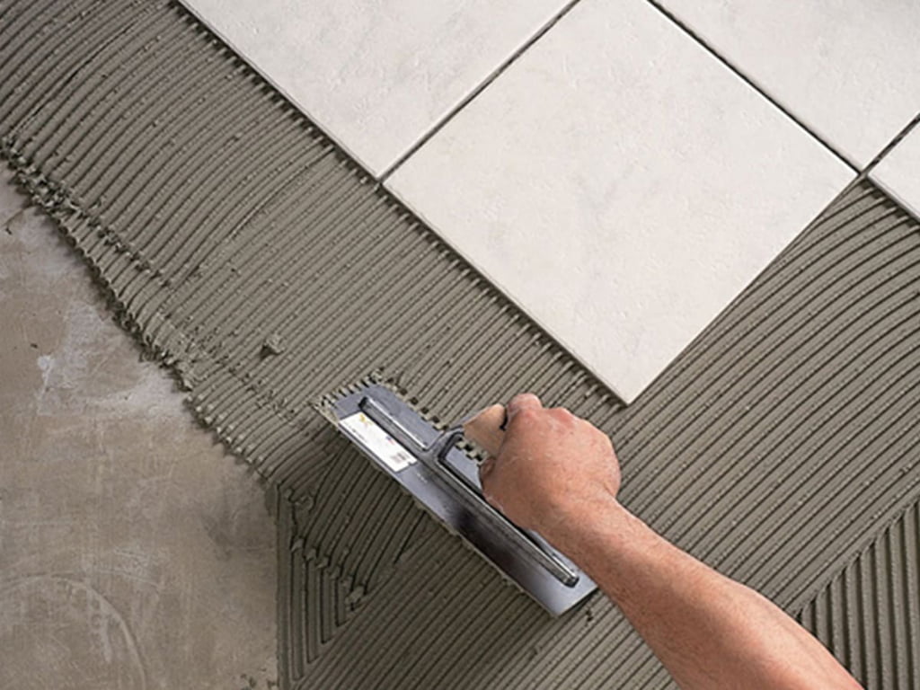 Tile adhesive application